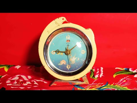 đồng hồ báo thức thiên nga bên hồ sen máy 8503 polaris toàn đồng xưa